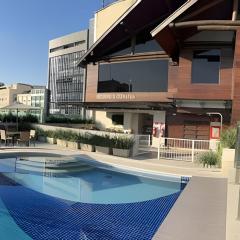 Queridinho Studio centro+Piscina+Netflix+WiFi