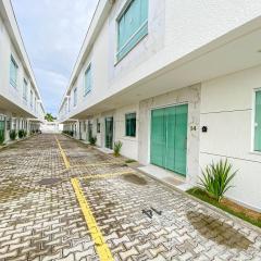 Casa com 4 quartos em condomínio com piscina e área gourmet próximo à praia de Taperapuã