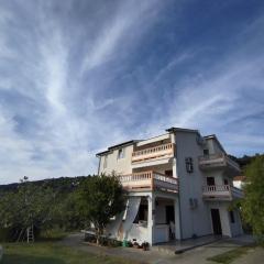 Apartments with parking space Palit, Rab - 23623