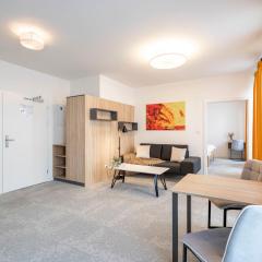ALURE RESIDENCES 12 & 24h self check-in & private parking next to the apartment building included, CITY CENTER right on SNP Square in a quiet passage, new building, best deal in town