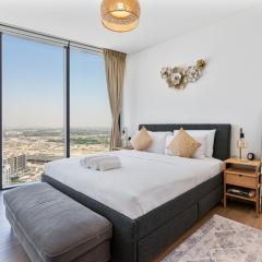 Chic 1BR with Balcony View, Gym, Pool & Kid-Friendly