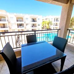 First floor apartment overlooking pool