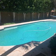 Quiet house with pool heater, patio, BBQ, citrus