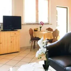 Bungalow by Lake Kummerow with Private Beach, cleaning included