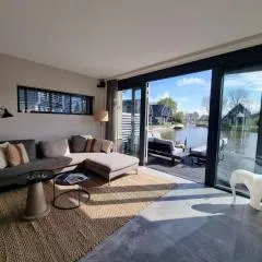 Luxurious detached water villa with jetty, cleaning included