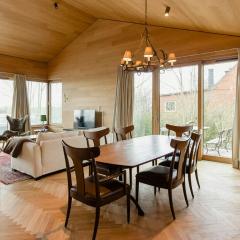 Wood Clad House At Eider's High Shore