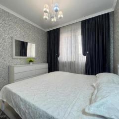 Apartment opposite Almaty Arena 13-64