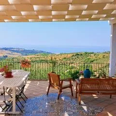 villa immersa in oliveto vista mare