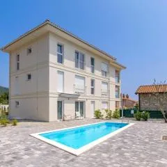 Apartment in Villa Marealto with pool, garage and seaview