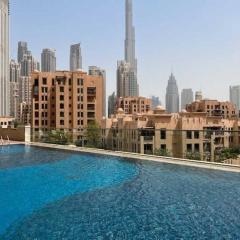 Vogue fully renovated brand new spacious one bedroom apartment with balcony with Amazing Burj view from the swimming pool located Bellevue tower downtown dubai walkable to burj khalifa and the dubai mall