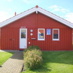 4 Personen Ferienhaus mit privatem Bootsteg, direkte Seelage, Kanu, Sauna und Kaminofen in Otterndorf