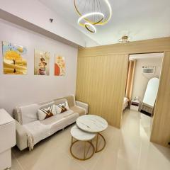 Cozy 1BR Condo at Grass Residences near SM North