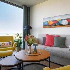 Lykke – Traumhafte Ferienwohnung mit Garten und Meerblick in erster Reihe!