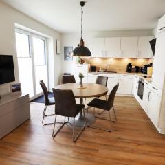 KÜSTE33/10 – Exklusive Ferienwohnung mit Sauna & nah am Strand!