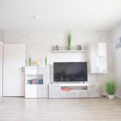 Ferienhaus mit Küche, Garten und Smart-TV