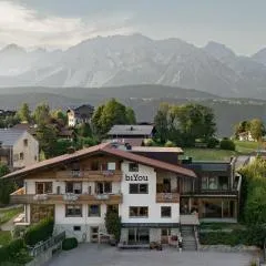 biYou Ecoquartier in den Bergen