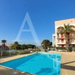 T2 avec loggia vue piscine, ascenseur et place de parking