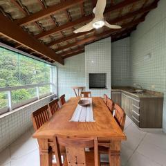 Cobertura 3 suítes com Ar condicionado, 300 metros da Praia Grande, Piscina, Wi-fi, Sauna