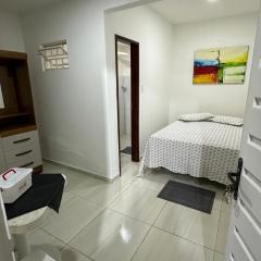Ambiente amplo com quarto