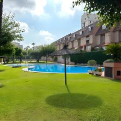 Adosado con piscina en la playa