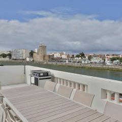 Maison vue sur le chenal avec toit terrasse