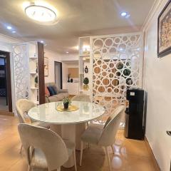 2BR Condo with Free Parking near SM North and Trinoma