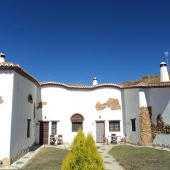 Cave house with private terrace on a small complex
