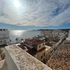 Duplex with spacious terraces and stunning sea views, right next to the beach
