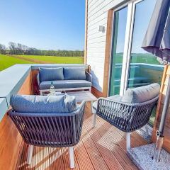 Deichbude Tossens - Modernes Ferienhaus für 4 Personen