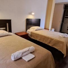 Dormitorio con baño compartido a 25 minutos del Apto