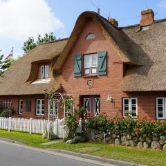 Ferien unterm Reetdach Whg 01