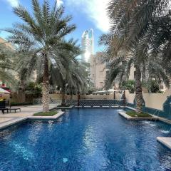 Dubai 2BR Pool View, Near Burj Khalifa, Canal & Attractions