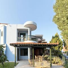 Nikiti Blue house 30m from the beach with sea view