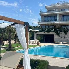 Family-friendly apartments with swimming pool Mandre, Pag - 24502