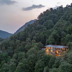 StayVista at Glass Forest with Bonfire, BBQ