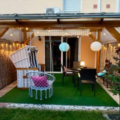 Ganzes Haus mit einer Terrasse, Garten und Klimaanlage