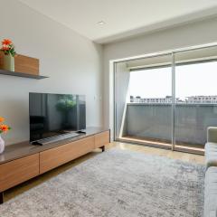 Stylish Home with Balcony & Garage by HostWise