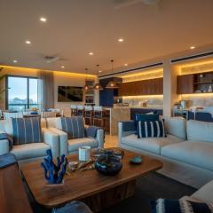 4BR Luxury Beachfront Apt w/ Heated Pool