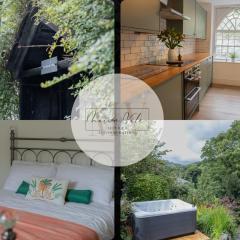 Stylish and spacious four-bedroom cottage by the river Eco-friendly hot tub, cozy open fireplace Beautiful view