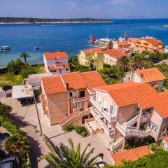 Apartments by the sea Banjol, Rab - 24825