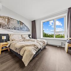 Modern city-center apartment with castle view