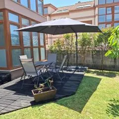 Apartamento con jardín