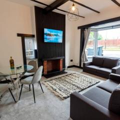 Elegant 4-Bedroom Getaway - Parking for 4 cars