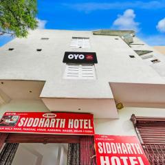 Hotel O Flagship Siddharth Hotel Yamuna Vihar C Block Stand