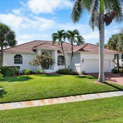 Seaside waterfront home with heated pool and dock