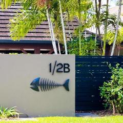 Fish on a Fence - Absolute Beachfront