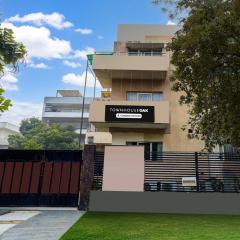 Super Townhouse Oak Sector 25 Gurgaon
