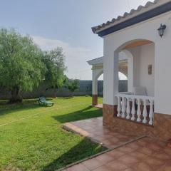 Casa con jardin privado en primera linea de playa
