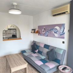 Apartamento California en Benidorm, 1 min playa levante, Wi-Fi, AC y parking