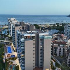 TULUM Bertioga - belo apartamento com vista para o mar